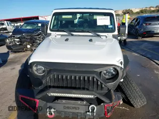 2021 Jeep Wrangler Sport S with VIN 1C4GJXAN2MW663880, listed as a IAAI auction lot 41059915 with 83,867 mi miles and . Bid and sale history available at DreamBid. Image 12.
