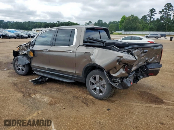 2020 Honda Ridgeline RTL-E with VIN 5FPYK3F79LB001891, listed as a Copart auction lot 58569255 with 34,513 mi miles and Salvage title. Bid and sale history available at DreamBid. Image 2.