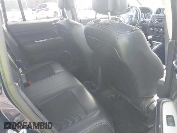 2016 Jeep Compass Latitude with VIN 1C4NJCEA9GD648025, listed as a IAAI auction lot 41558791 with 122,273 mi miles. Bid and sale history available at carsss.com. Image 8.