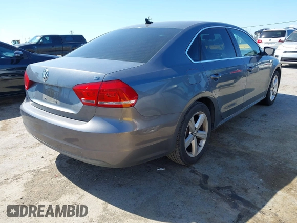 2013 Volkswagen Passat SE w/Sunroof & Nav with VIN 1VWBP7A35DC148149, listed as a IAAI auction lot 42148096 with 228,555 mi miles. Bid and sale history available at carsss.com. Image 4.
