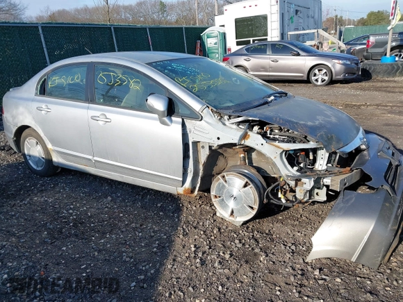 2006 Honda Civic z VIN JHMFA36246S022144, wystawiony jako IAAI lot #41976752 z przebiegiem Nie podano mil oraz . Historia ofert i sprzedaży dostępna na DreamBid. Obrazek 1.