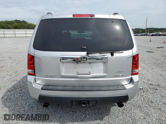 2010 Honda Pilot Touring with VIN 5FNYF3H82AB011212, listed as a Copart auction lot 71115874 with 248,495 mi miles and Salvage Title. Bid and sale history available at DreamBid. Image 6.