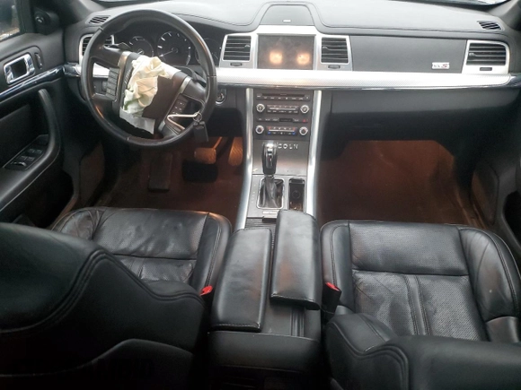 2011 Lincoln MKS EcoBoost with VIN 1LNHL9FT5BG610255, listed as a Copart auction lot 81505834 with 143,380 mi miles and Clean title. Bid and sale history available at DreamBid. Image 8.