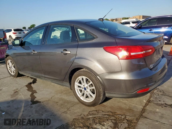 2018 Ford Focus SE z VIN 1FADP3F2XJL256272, wystawiony jako Copart lot #52651675 z przebiegiem 37 897 mil mil oraz Szkody całkowita. Historia ofert i sprzedaży dostępna na DreamBid. Obrazek 2.