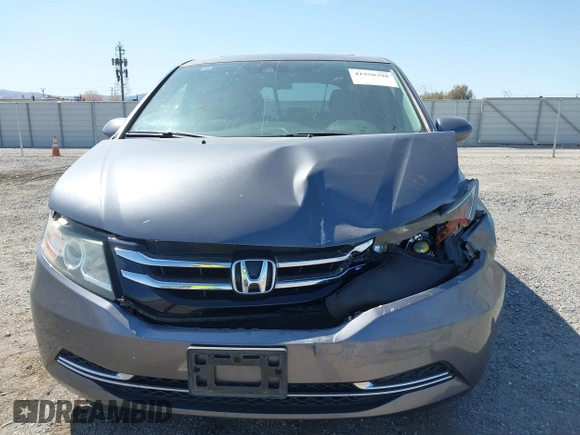 2014 Honda Odyssey EX-L with VIN 5FNRL5H67EB096027, listed as a IAAI auction lot 41950398 with 147,158 mi miles and . Bid and sale history available at DreamBid. Image 6.