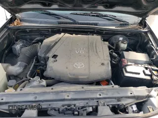 2010 Toyota Tacoma PreRunner with VIN 3TMJU4GN5AM097146, listed as a Copart auction lot 62339915 with 329,044 mi miles and Salvage title. Bid and sale history available at DreamBid. Image 11.