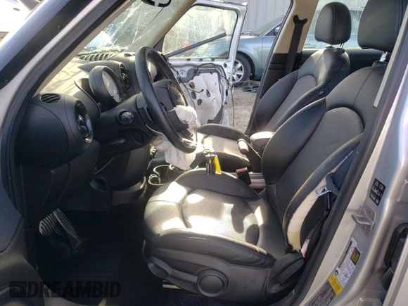 2016 MINI Countryman S with VIN WMWZC5C55GWU22112, listed as a Copart auction lot 82132654 with 60,210 mi miles and Salvage Title. Bid and sale history available at DreamBid. Image 7.