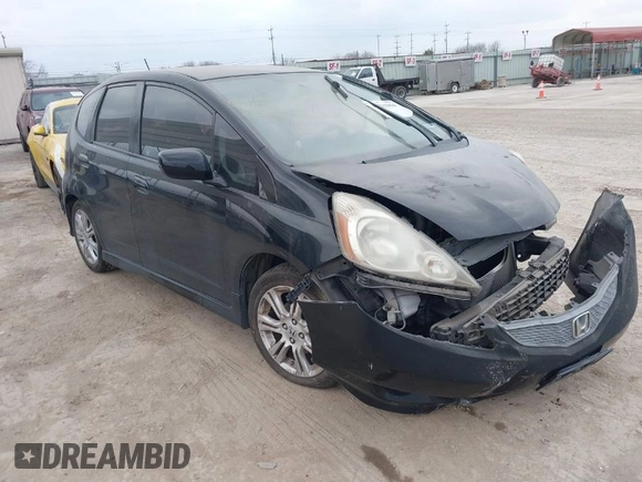 2009 Honda Fit Sport with VIN JHMGE88499S027610, listed as a IAAI auction lot 41712904 with 147,069 mi miles. Bid and sale history available at carsss.com. Image 1.