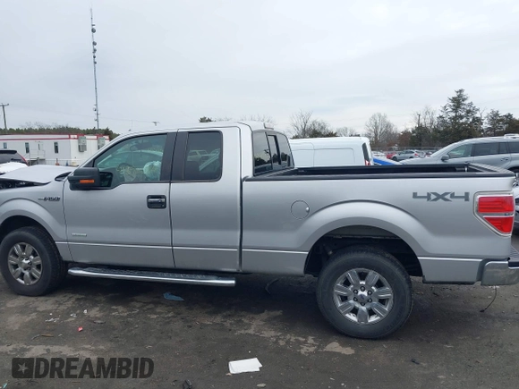 2014 Ford F-150 XL with VIN 1FTFX1ET3EFC39285, listed as a IAAI auction lot 41390024 with 217,856 mi miles. Bid and sale history available at carsss.com. Image 14.