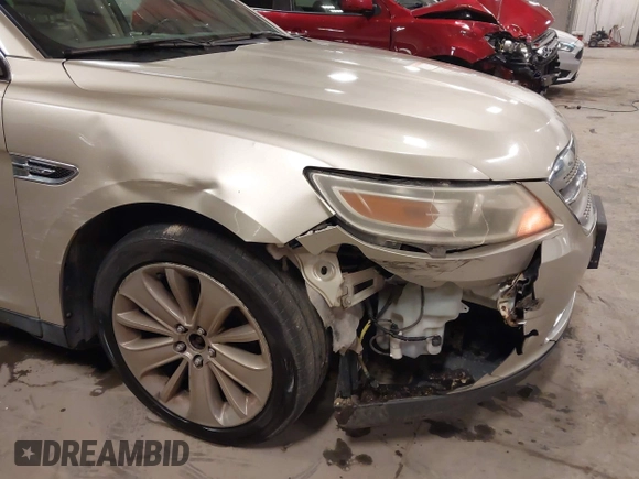 2010 Ford Taurus Limited with VIN 1FAHP2FW9AG133764, listed as a IAAI auction lot 41823527 with 243,477 mi miles and . Bid and sale history available at DreamBid. Image 6.