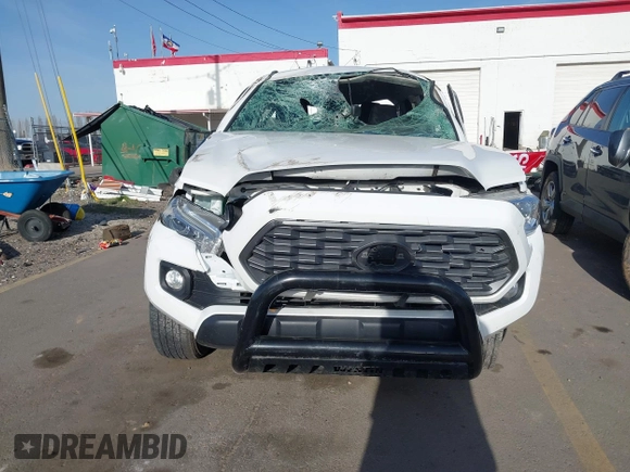2022 Toyota Tacoma SR5 with VIN 3TMDZ5BNXNM122169, listed as a IAAI auction lot 41992758 with 36,686 mi miles and . Bid and sale history available at DreamBid. Image 12.