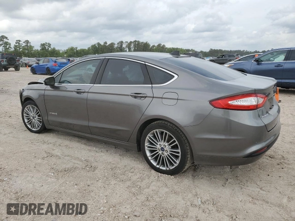 2014 Ford Fusion SE Hybrid with VIN 3FA6P0LU8ER343625, listed as a Copart auction lot 54844285 with 181,631 mi miles and Salvage Title. Bid and sale history available at DreamBid. Image 2.