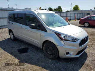 2022 Ford Transit Connect XLT z VIN NM0GS9F29N1508116, wystawiony jako Copart lot #63421865 z przebiegiem 67 334 mil mil oraz Czysty tytuł • Clean title. Historia ofert i sprzedaży dostępna na DreamBid. Obrazek 4.