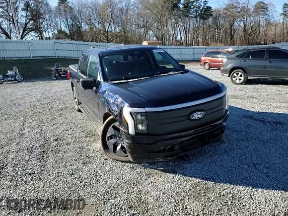 2024 Ford F-150 Lightning XLT with VIN 1FTVW3LK1RWG18473, listed as a Copart auction lot 86523084 with 6,824 mi miles and Salvage title. Bid and sale history available at DreamBid. Image 11.