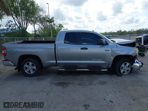 2017 Toyota Tundra SR5 z VIN 5TFRW5F10HX221961, wystawiony jako IAAI lot #42178312 z przebiegiem 54 904 mil mil oraz . Historia ofert i sprzedaży dostępna na DreamBid. Obrazek 13.