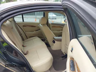 2005 Jaguar S-Type with VIN SAJWA01T05FN51342, listed as a IAAI auction lot 42047599 with 173,261 mi miles and . Bid and sale history available at DreamBid. Image 8.