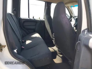 2003 Jeep Liberty Sport with VIN 1J4GL48K93W511690, listed as a IAAI auction lot 42066355 with 115,008 mi miles. Bid and sale history available at carsss.com. Image 8.