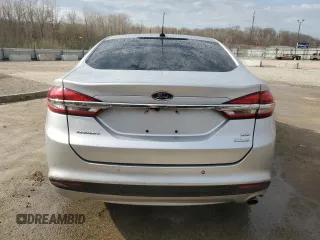 2018 Ford Fusion SE с VIN 3FA6P0HD9JR201805, выставлен на аукционе Copart как лот 50547855 с пробегом 111 660 миль миль и На запчасти • Non repairable. История ставок и продаж доступна на DreamBid. Изображение 6.