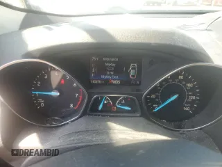 2017 Ford Escape SE z VIN 1FMCU0GD5HUD52467, wystawiony jako Copart lot #70616944 z przebiegiem 115 876 mil mil oraz Szkoda całkowita • Salvage title. Historia ofert i sprzedaży dostępna na DreamBid. Obrazek 9.