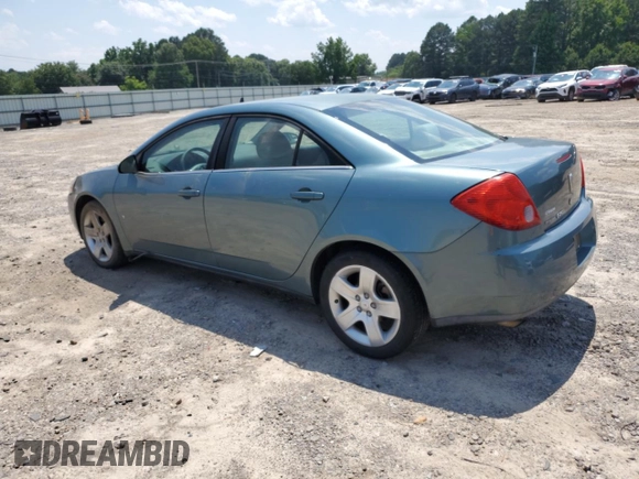 2009 Pontiac G6 1SA with VIN 1G2ZG57B294112753, listed as a Copart auction lot 60333295 with 172,422 mi miles and Salvage title. Bid and sale history available at DreamBid. Image 2.