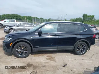 2023 Volkswagen Tiguan SE with VIN 3VVMB7AXXPM003447, listed as a IAAI auction lot 42566061 with 39,185 mi miles and . Bid and sale history available at DreamBid. Image 14.