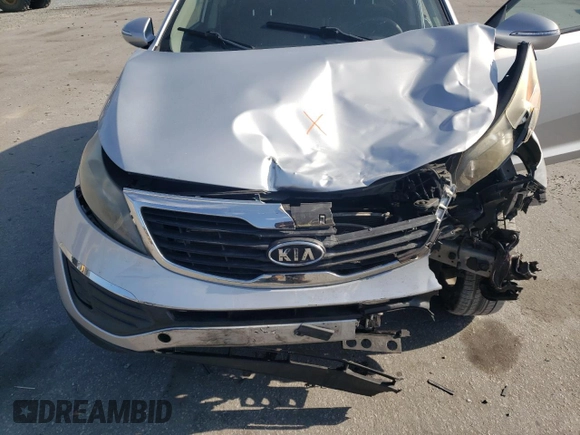2011 Kia Sportage LX z VIN KNDPBCA2XB7102202, wystawiony jako Copart lot #55606785 z przebiegiem 84 311 mil mil oraz Szkoda całkowita • Salvage title. Historia ofert i sprzedaży dostępna na DreamBid. Obrazek 12.