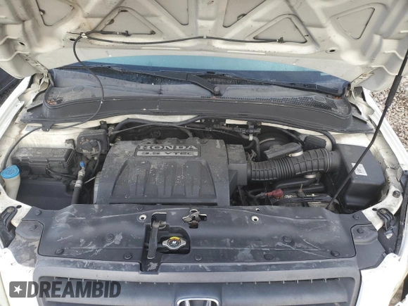 2005 Honda Pilot EX-L z VIN 5FNYF18505B042748, wystawiony jako Copart lot #56696285 z przebiegiem 181 638 mil mil oraz Szkoda całkowita • Salvage title. Historia ofert i sprzedaży dostępna na DreamBid. Obrazek 11.