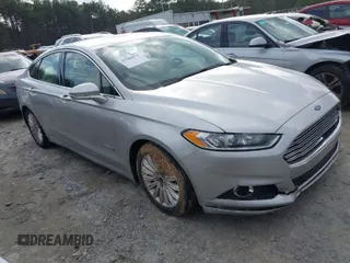 2015 Ford Fusion SE Hybrid with VIN 3FA6P0LU2FR166877, listed as a IAAI auction lot 41586973 with 58,428 mi miles. Bid and sale history available at carsss.com. Image 1.