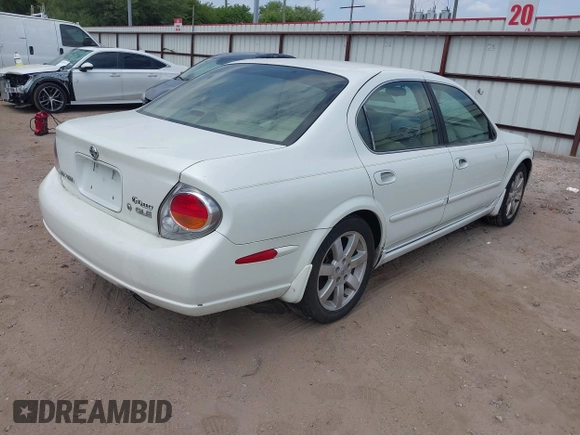 2002 Nissan Maxima GLE z VIN JN1DA31AX2T313083, wystawiony jako IAAI lot #42040751 z przebiegiem 182 814 mil mil oraz . Historia ofert i sprzedaży dostępna na DreamBid. Obrazek 4.