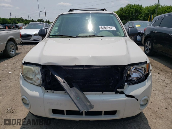 2012 Ford Escape XLT z VIN 1FMCU9DG3CKA41742, wystawiony jako Copart lot #60092135 z przebiegiem 175 330 mil mil oraz Szkoda całkowita • Salvage title. Historia ofert i sprzedaży dostępna na DreamBid. Obrazek 5.