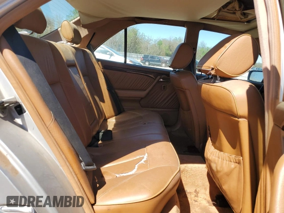 1995 Mercedes-Benz C with VIN WDBHA28E7SF255142, listed as a Copart auction lot 68411704 with 334,000 mi miles and Salvage Title. Bid and sale history available at carsss.com. Image 10.
