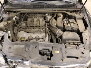 2011 Ford Taurus SE with VIN 1FAHP2DW3BG163699, listed as a Copart auction lot 43186495 with 84,493 mi miles and Salvage Title. Bid and sale history available at DreamBid. Image 11.