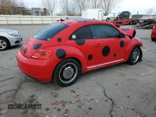 2013 Volkswagen Beetle with VIN 3VWHX7AT8DM604332, listed as a Copart auction lot 79781264 with 125,692 mi miles and Salvage Title. Bid and sale history available at DreamBid. Image 3.