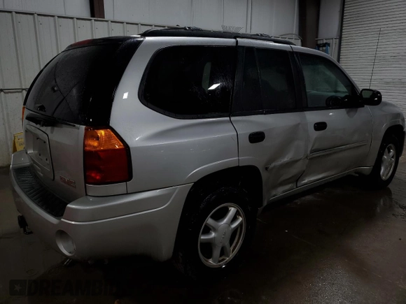 2007 GMC Envoy SLT with VIN 1GKDT13S572310014, listed as a Copart auction lot 44322845 with 152,489 mi miles and Salvage Title. Bid and sale history available at carsss.com. Image 3.