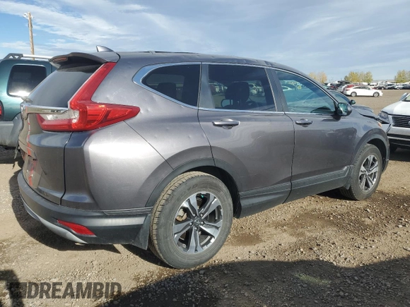 2017 Honda CR-V LX with VIN 2HKRW1H36HH000058, listed as a Copart auction lot 74264374 with 118,314 mi miles and Salvage Title. Bid and sale history available at carsss.com. Image 3.
