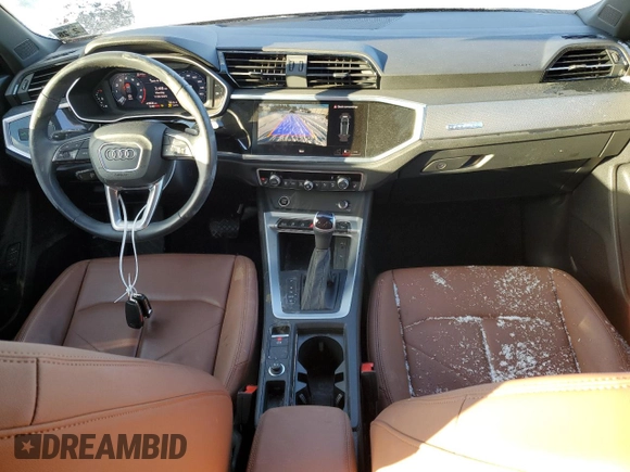 2023 Audi Q3 S line Premium z VIN WA1DECF35P1075264, wystawiony jako Copart lot #88866885 z przebiegiem 42 824 mil mil oraz Szkody całkowita. Historia ofert i sprzedaży dostępna na DreamBid. Obrazek 8.