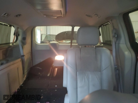 2013 Chrysler Town & Country Limited with VIN 2C4RC1GG2DR713405, listed as a Copart auction lot 65249484 with 141,573 mi miles and Clean Title. Bid and sale history available at DreamBid. Image 10.