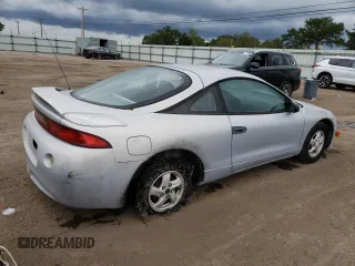 1999 Mitsubishi Eclipse RS with VIN 4A3AK34Y4XE055125, listed as a Copart auction lot 73249544 with 100,125 mi miles and Clean Title. Bid and sale history available at carsss.com. Image 3.