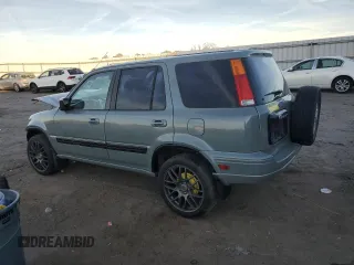 2000 Honda CR-V EX with VIN JHLRD1863YC006639, listed as a Copart auction lot 80442254 with 200,218 mi miles and Salvage Title. Bid and sale history available at carsss.com. Image 2.