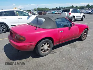1993 Mazda MX-5 Miata with VIN JM1NA3513P0414468, listed as a IAAI auction lot 42653718 with 292,497 mi miles and . Bid and sale history available at DreamBid. Image 4.