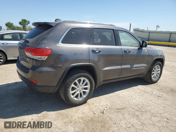 2016 Jeep Grand Cherokee Laredo with VIN 1C4RJFAG2GC328841, listed as a Copart auction lot 63553435 with 100,472 mi miles and Salvage title. Bid and sale history available at DreamBid. Image 3.