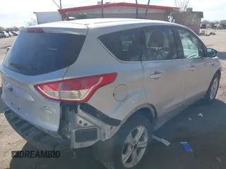 2014 Ford Escape SE z VIN 1FMCU0GX3EUB64164, wystawiony jako IAAI lot #41619535 z przebiegiem 100 767 mil mil oraz . Historia ofert i sprzedaży dostępna na DreamBid. Obrazek 4.