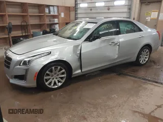 2014 Cadillac CTS Luxury AWD with VIN 1G6AX5S3XE0158960, listed as a IAAI auction lot 41258609 with 84,360 mi miles and . Bid and sale history available at DreamBid. Image 2.