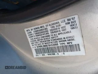 2007 Honda Odyssey EX-L z VIN 5FNRL38667B453060, wystawiony jako IAAI lot #42066637 z przebiegiem 184 439 mil mil oraz . Historia ofert i sprzedaży dostępna na DreamBid. Obrazek 9.