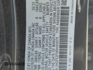 2024 Honda Civic Sport z VIN 2HGFE2F56RH505576, wystawiony jako Copart lot #48709075 z przebiegiem 31 854 mil mil oraz Szkoda całkowita • Salvage title. Historia ofert i sprzedaży dostępna na DreamBid. Obrazek 14.