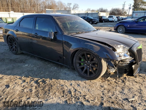 2006 Chrysler 300 C SRT8 with VIN 2C3LA73W56H450447, listed as a Copart auction lot 45502875 with 130,728 mi miles and Salvage Title. Bid and sale history available at carsss.com. Image 4.