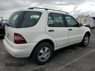 2004 Mercedes-Benz M-Class 3.5L with VIN 4JGAB57E74A501184, listed as a Copart auction lot 77801184 with 0 mi miles and Salvage Title. Bid and sale history available at carsss.com. Image 3.