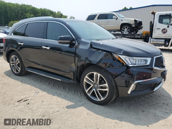 2017 Acura MDX Advance z VIN 5FRYD4H9XHB006658, wystawiony jako Copart lot #59113645 z przebiegiem 107 465 mil mil oraz Szkoda całkowita • Salvage title. Historia ofert i sprzedaży dostępna na DreamBid. Obrazek 4.
