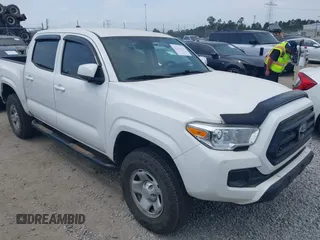 2022 Toyota Tacoma SR with VIN 3TYCZ5AN9NT098903, listed as a IAAI auction lot 42088505 with 93,000 mi miles and . Bid and sale history available at DreamBid. Image 1.