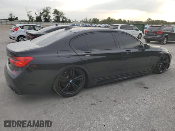 2016 BMW 7 Series 750i with VIN WBA7F0C56GGL99533, listed as a Copart auction lot 59091045 with 124,624 mi miles and Clean title. Bid and sale history available at DreamBid. Image 3.
